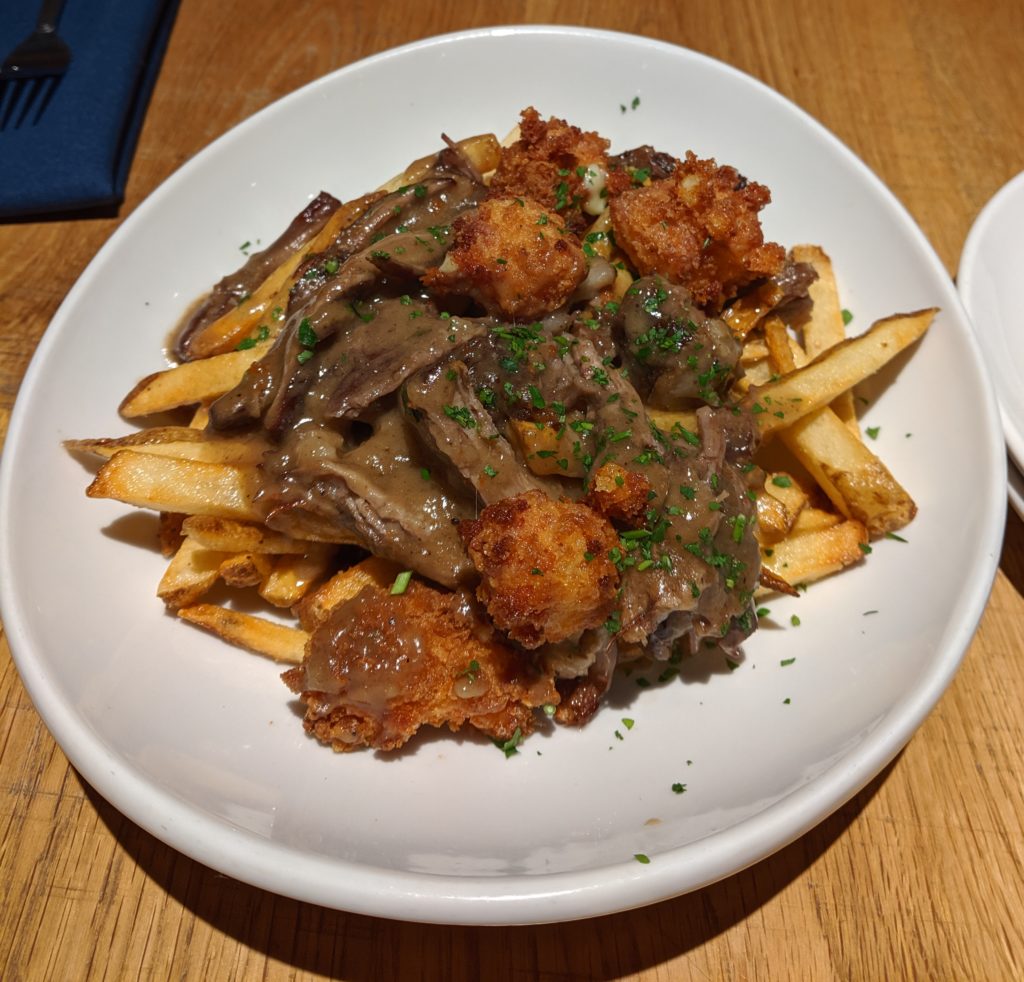 short rib poutine at harvest pizzeria by fartley farms