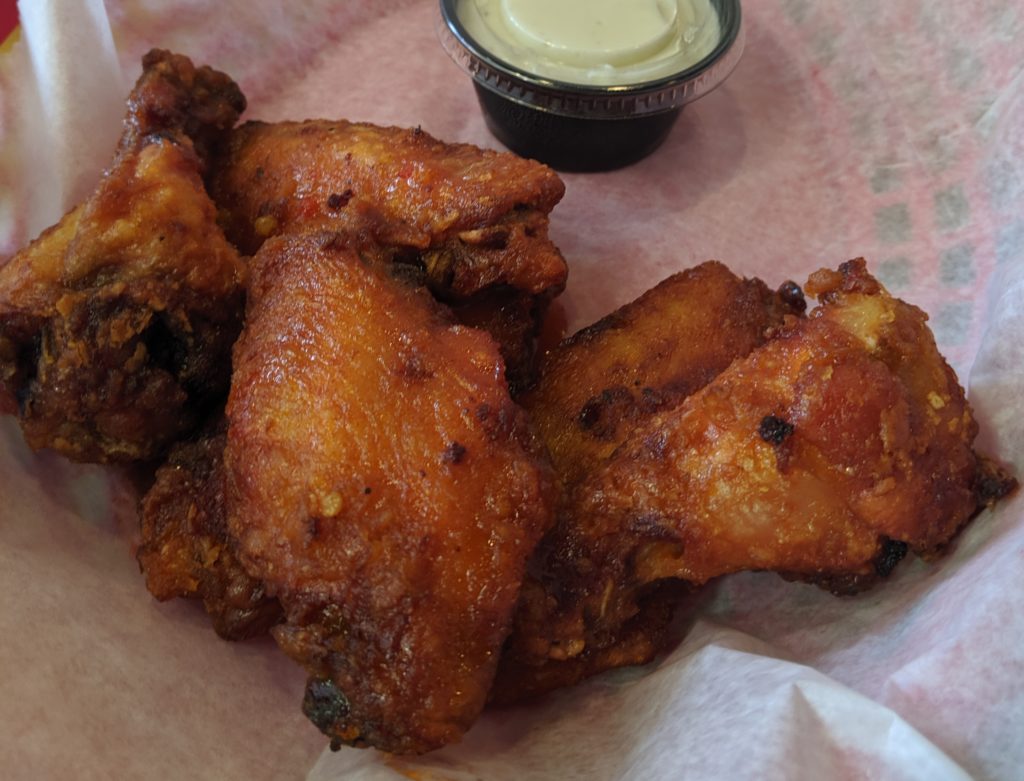 hog fire wings at hoggys by fartley farms.